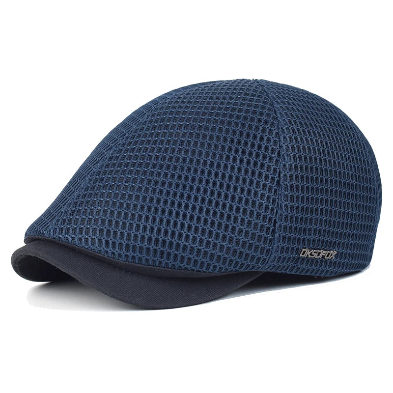 Navy blue unisex flat cap in a breathable mesh fabric with a solid dark brim.