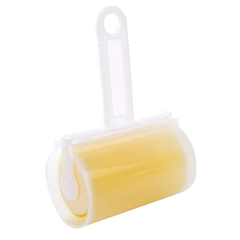 Reusable yellow silicone lint roller with a white plastic handle and protective cover against a white background.