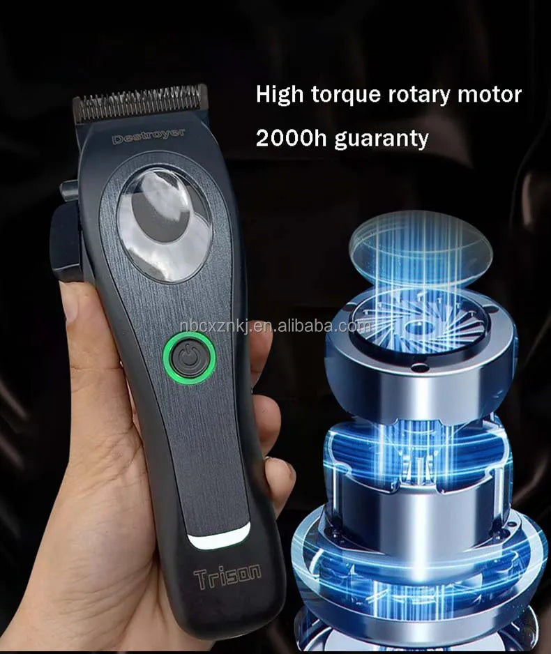 Hand holding a matte black cordless hair clipper with a green-lit power button and high-torque rotary motor detail.