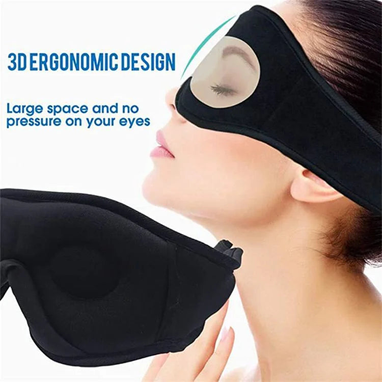 A person wearing a soft, black 3D ergonomic Bluetooth sleep eye mask with built-in wireless headphones.