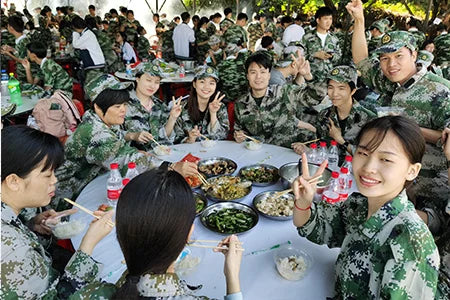 Please provide the correct product image! You have uploaded a photo of people in camouflage uniforms eating at a table.