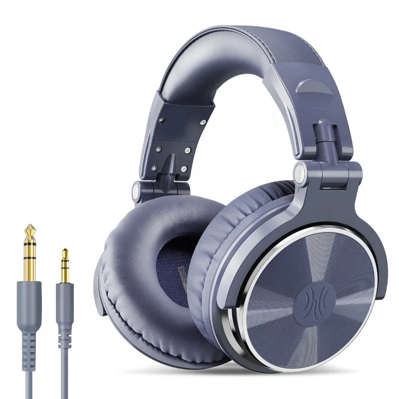 Grey wired over-ear studio headphones with padded cushions and two interchangeable jack leads on a white background.