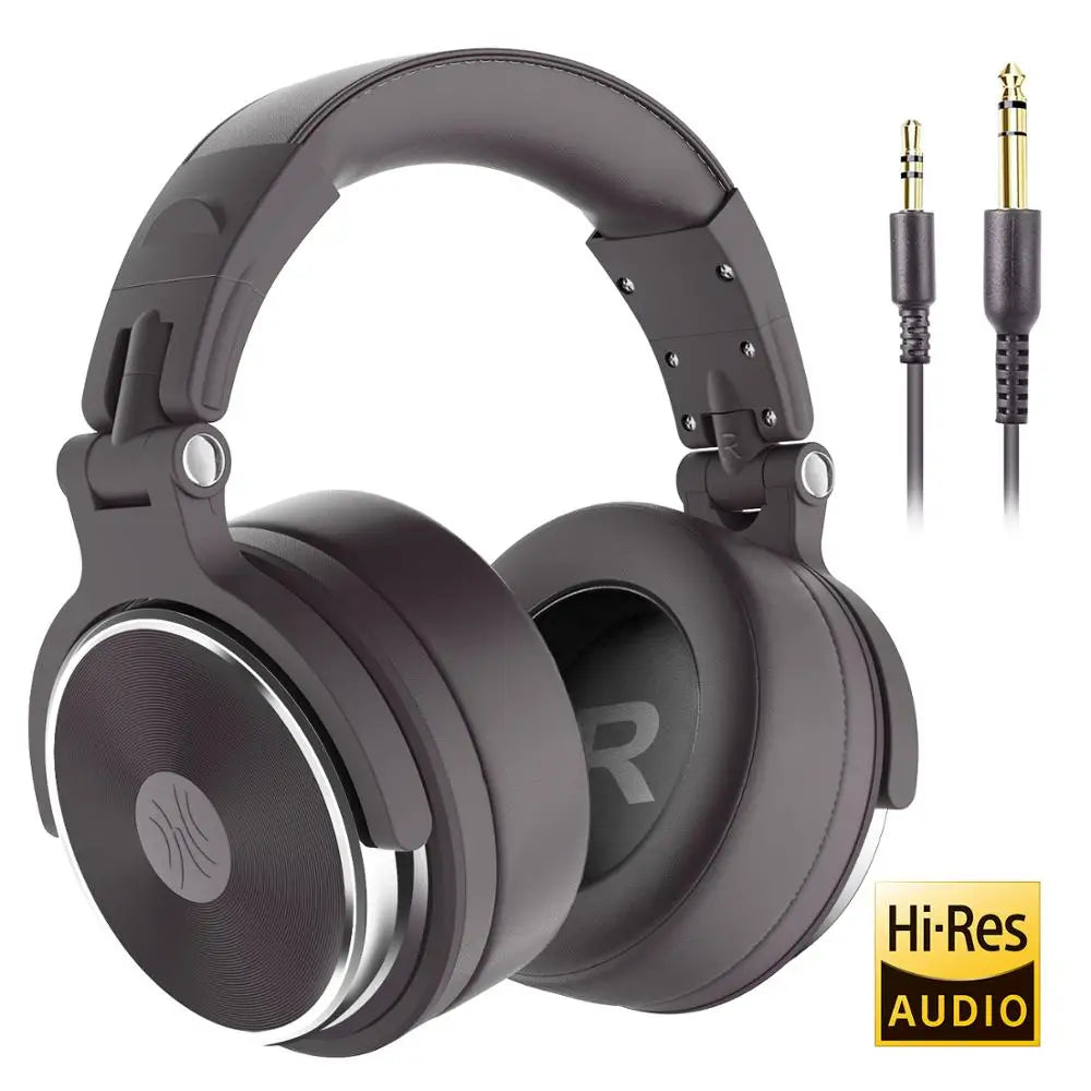 Black over-ear wired studio headphones with metallic silver accents, adjustable headband and two gold-tipped audio jacks.