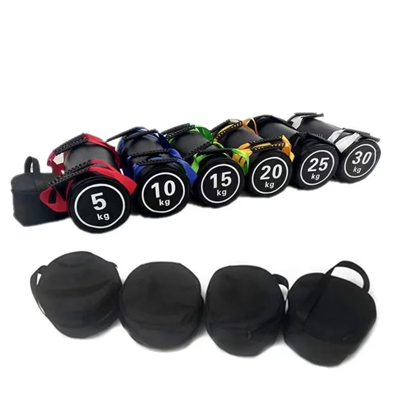 Black fitness energy sandbags in weights from 5kg to 30kg with colored handles and white weight labels.