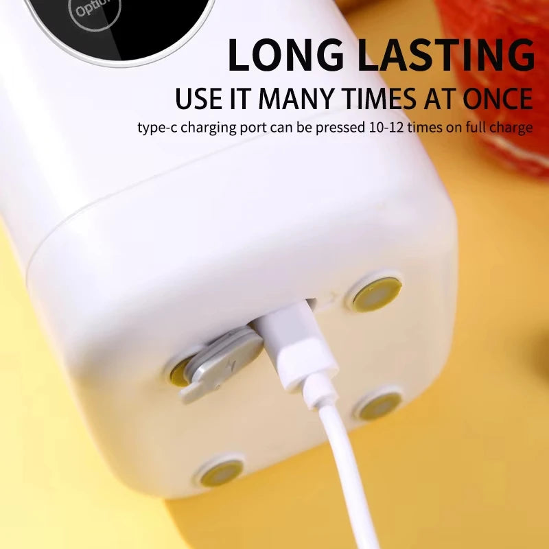 White, rectangular, handheld device with a USB-C charging cable plugged into the base on a yellow background.