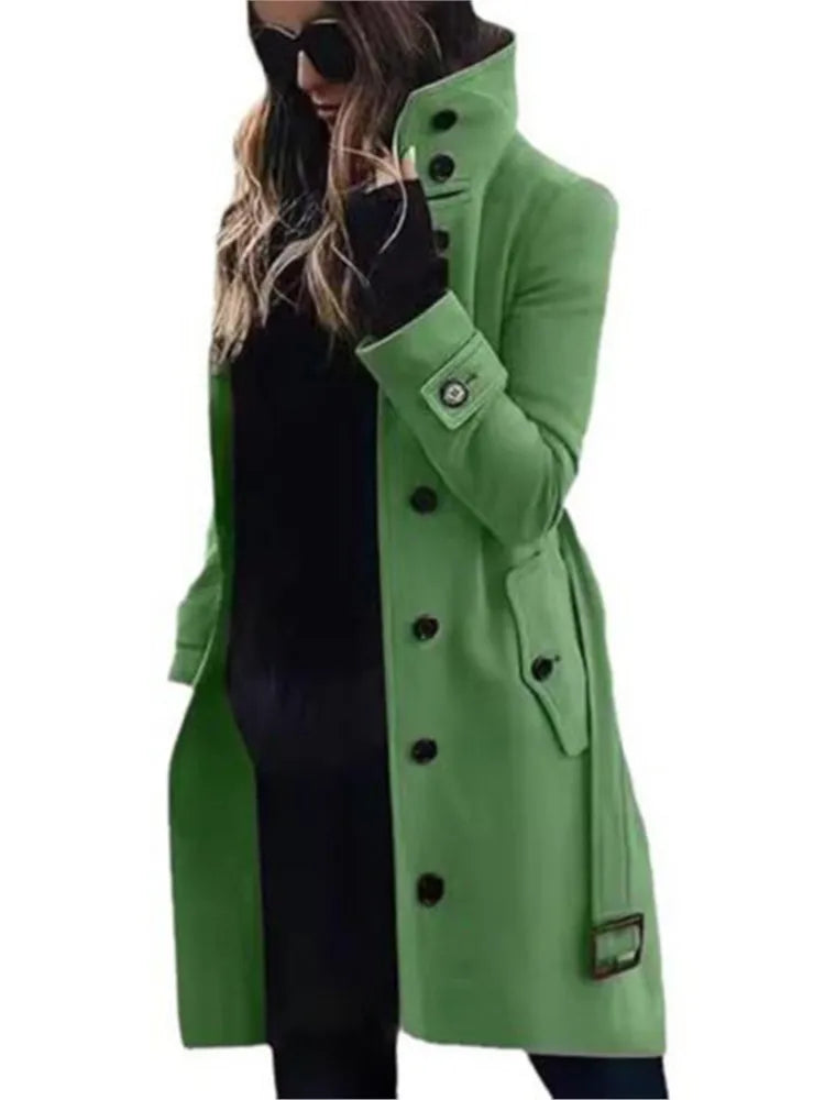 Bright green, long-line tailored coat featuring a high collar, button-up front, and decorative cuff straps.
