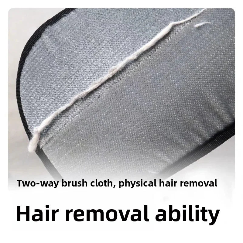 Grey lint-removing fabric with a line of collected white fibres, demonstrating effective hair removal.
