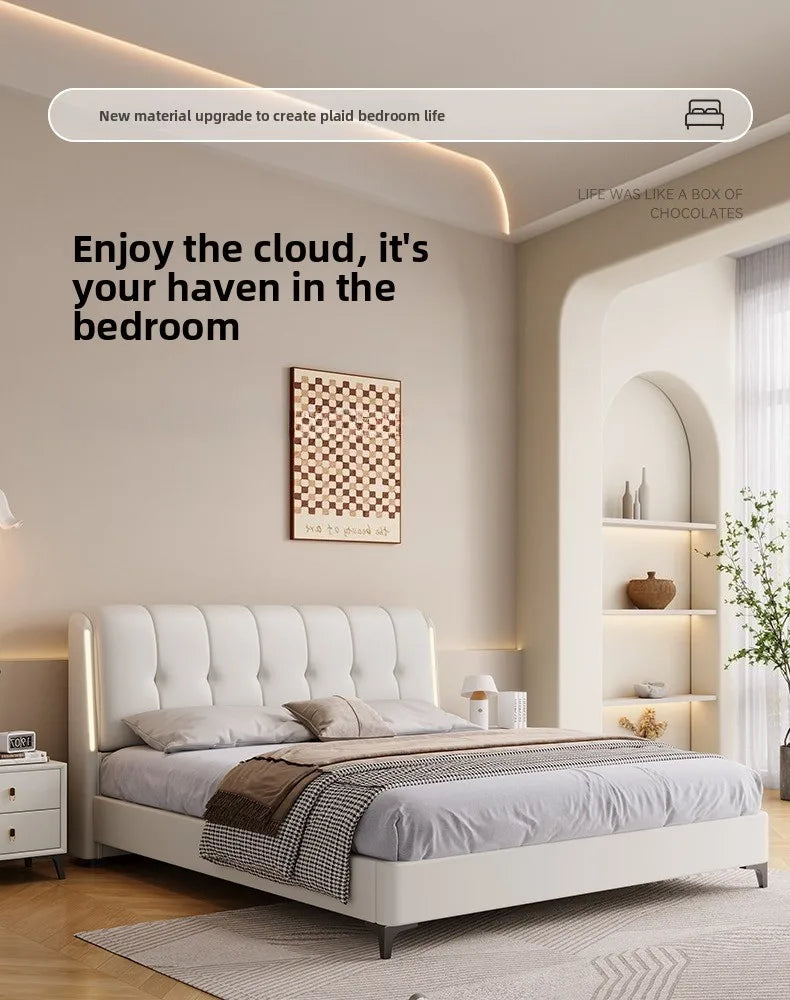 Modern minimalist cream white storage bed frame with an upholstered, button-tufted headboard and integrated side lights.