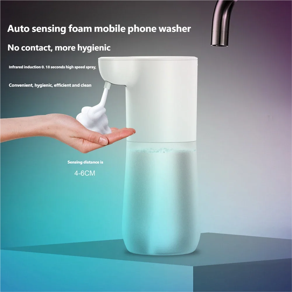 White automatic touchless foam soap dispenser dispensing soap into a hand, 350ml capacity.