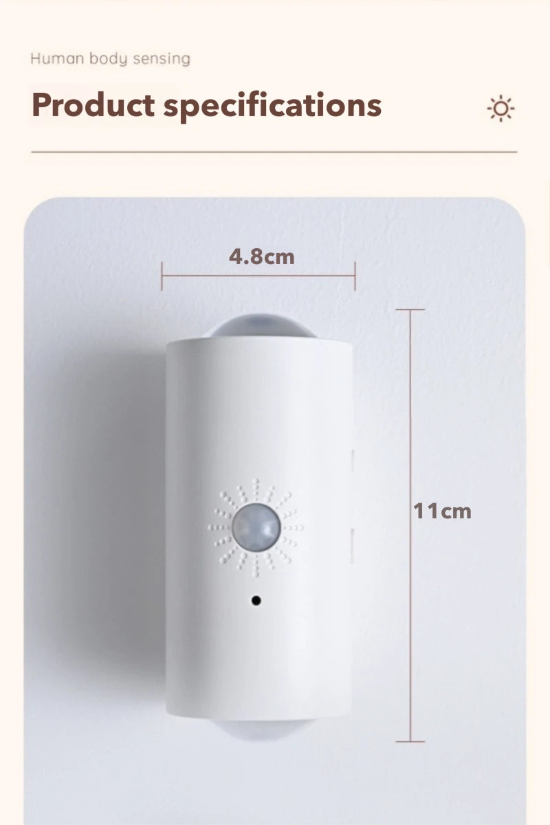 White, cylindrical rechargeable LED wall lamp with motion sensor. Measures 4.8cm wide by 11cm high.