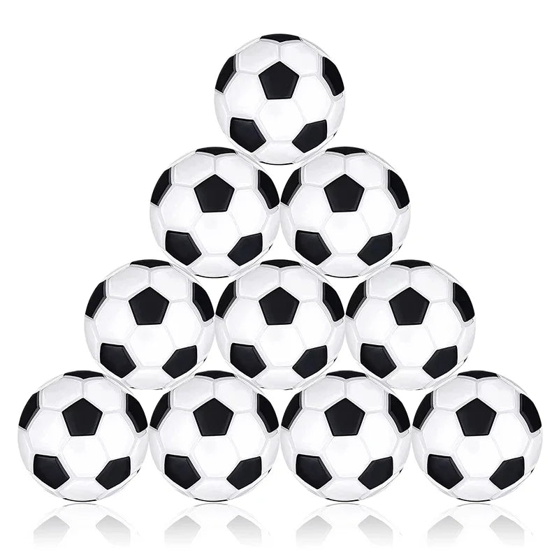 Pyramid stack of ten classic white and black pentagon-patterned footballs.