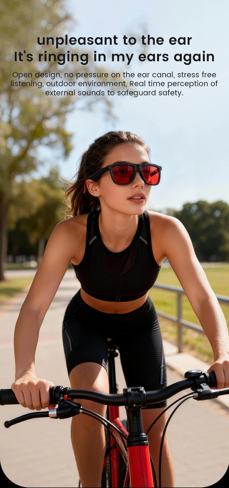 A woman cycling outdoors wearing stylish black smart audio glasses with red-tinted lenses for music and calls.