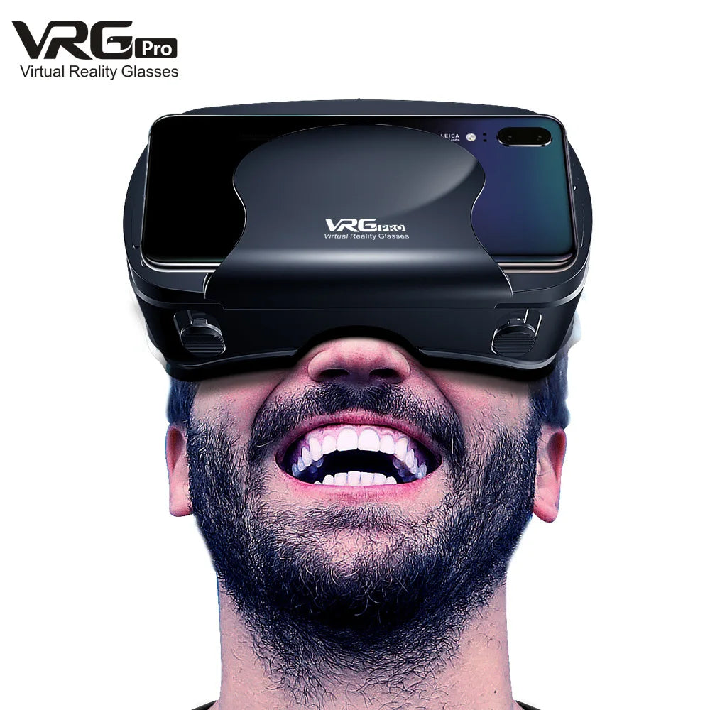 A man wearing sleek, black smartphone-compatible virtual reality glasses, smiling with excitement.
