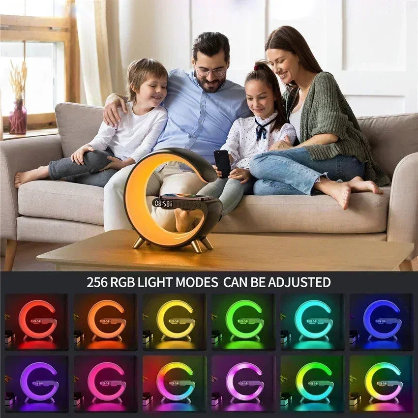G-shaped wireless charging stand with RGB lighting, Bluetooth speaker, and LED digital clock on a coffee table.