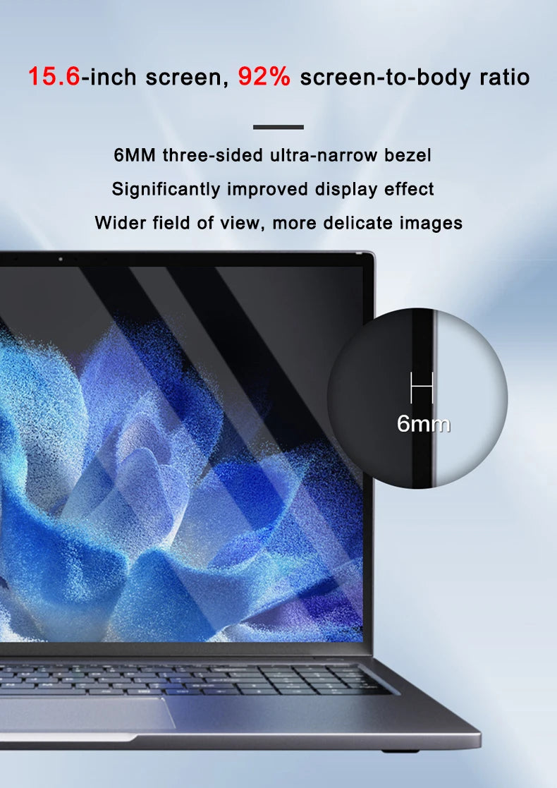 15.6-inch laptop with a slim 6mm bezel, 92% screen-to-body ratio, and sleek metallic grey finish.