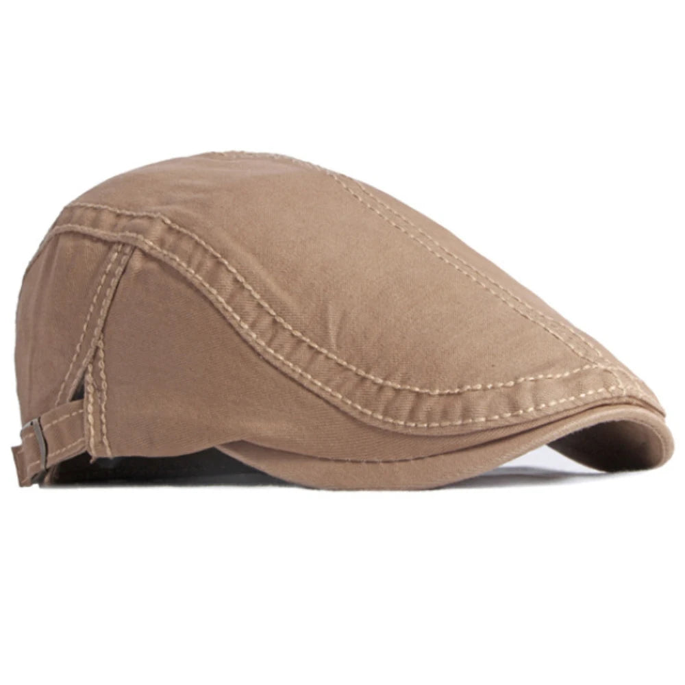 Side view of a khaki cotton flat cap with structured panels, contrast stitching, and an adjustable side strap.