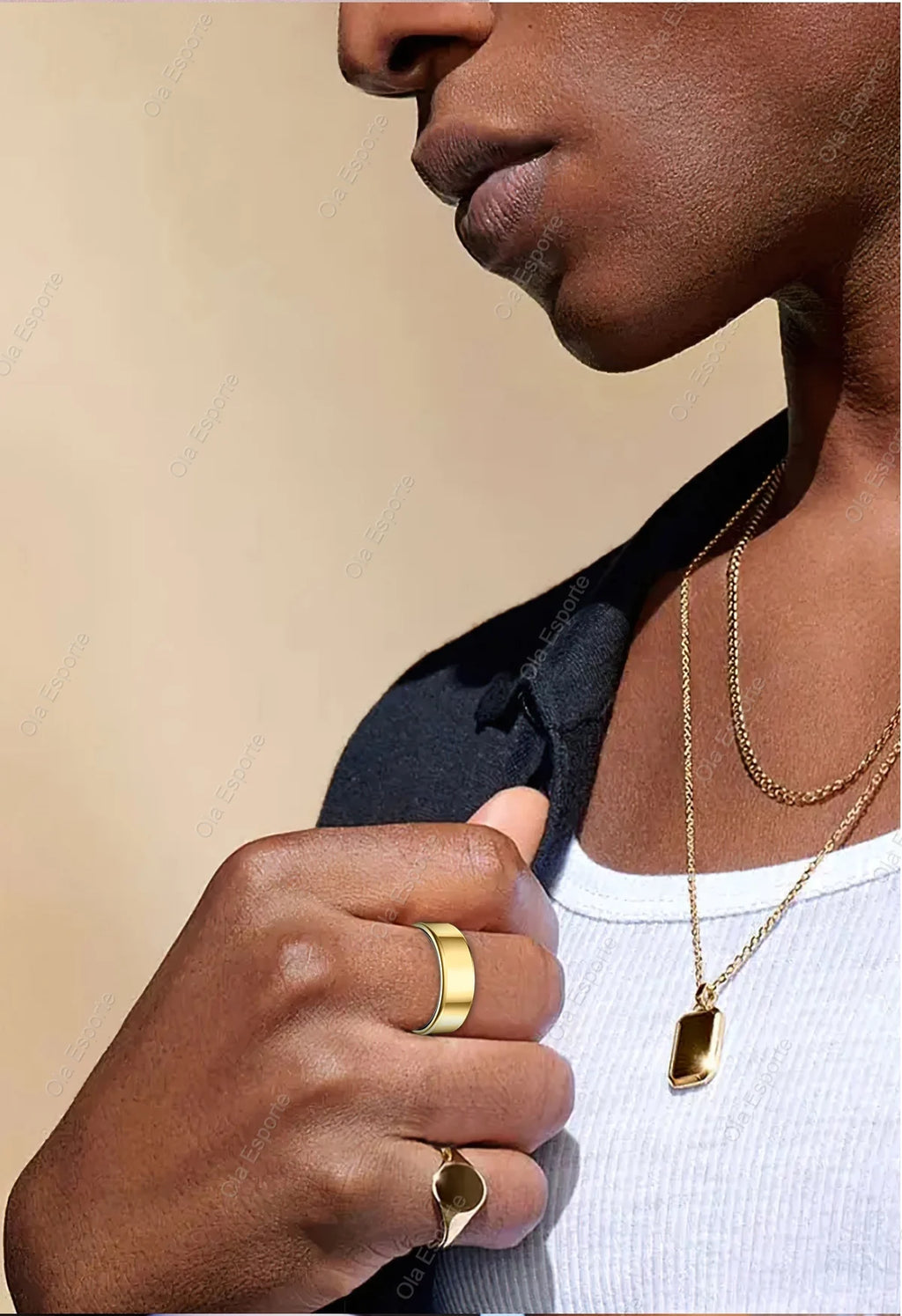Sleek, gold-coloured smart fitness ring worn on a finger, featuring a minimalist, smooth, polished design.