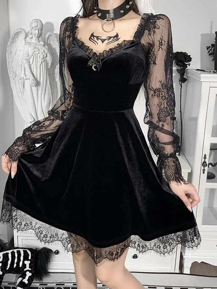 Black velvet mini dress with V-neck, lace trim, and sheer long sleeves, in an A-line silhouette.