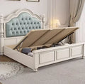 Cream double bed with a button-tufted sage green headboard and a practical gas-lift ottoman storage base.
