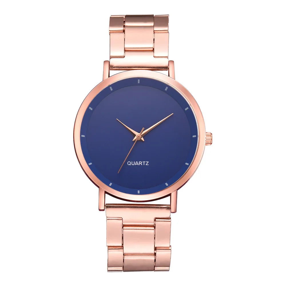 Ladies' rose gold stainless steel watch with a minimalist dark blue dial and matching rose gold hands.