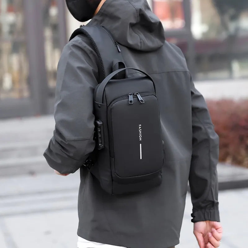 A sleek, black anti-theft chest bag with a combination lock and side USB port worn over the shoulder.