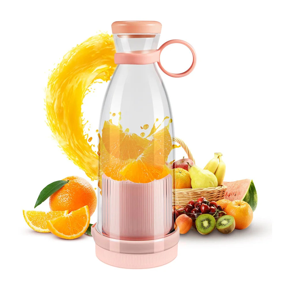 Portable pink blender bottle with a clear body and a carry loop, displayed among fresh assorted fruits.