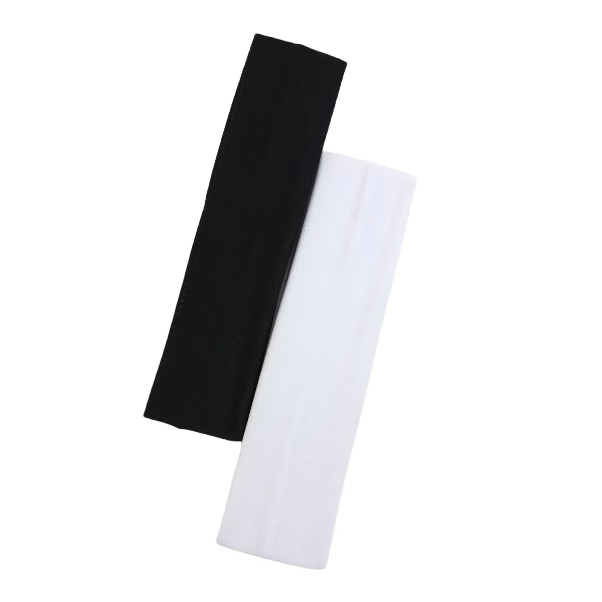 A pair of plain sports headbands, one black and one white, laid out against a plain white background.