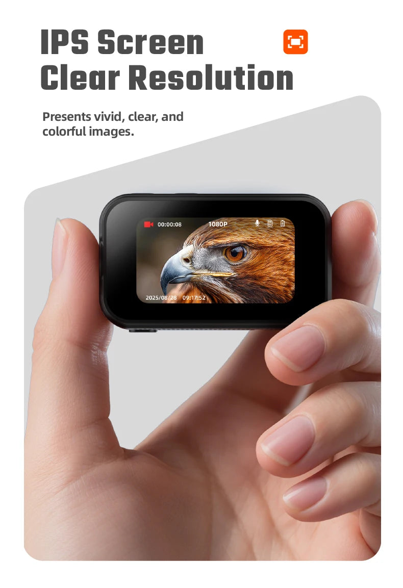 Hand holding a small black plastic action camera displaying a 1080p IPS screen with an eagle image.