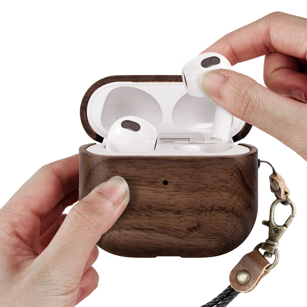 Dark brown wooden protective case for Apple AirPods 3, featuring a vintage-style lanyard and metal clip.