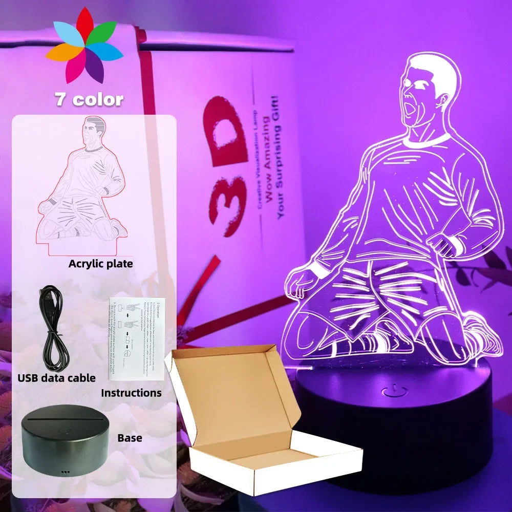 3D LED illusion lamp featuring a kneeling footballer, with 7-color light settings, USB cable, base, and gift box.