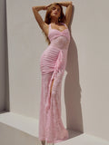 Pink lace halter maxi dress with ruched bodycon fit, draped front, and thigh-high slit.