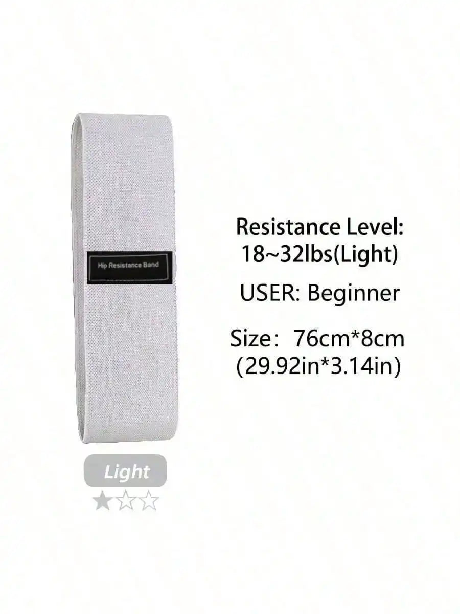 Light-grey fabric hip resistance band with a black label, marked as 18-32lbs light resistance.