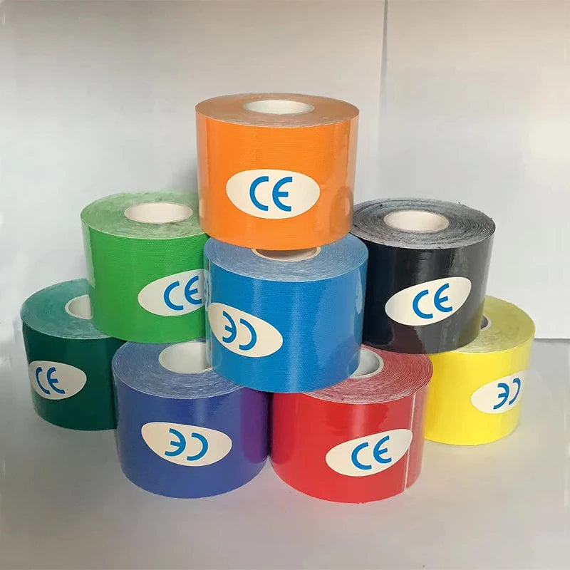 A stack of colourful Kinesiology sports tape rolls, each featuring a white oval label with a blue CE logo.