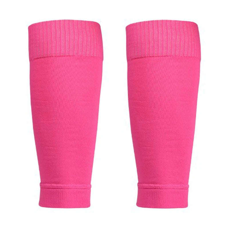 Pair of bright pink compression leg sleeves with a ribbed elastic top band for a secure, comfortable fit.