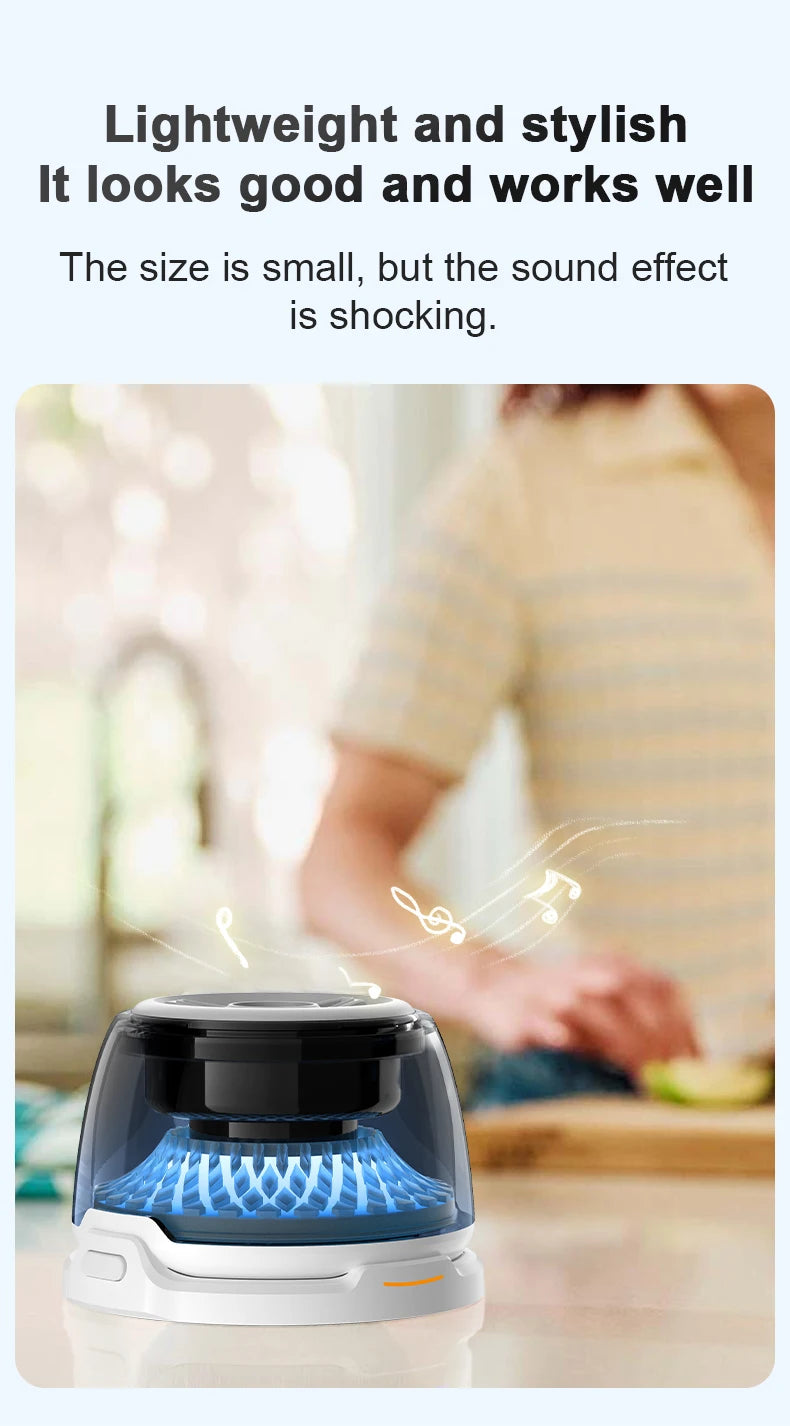 Small, round, portable Bluetooth speaker with a white base and blue light effect in a clear casing.
