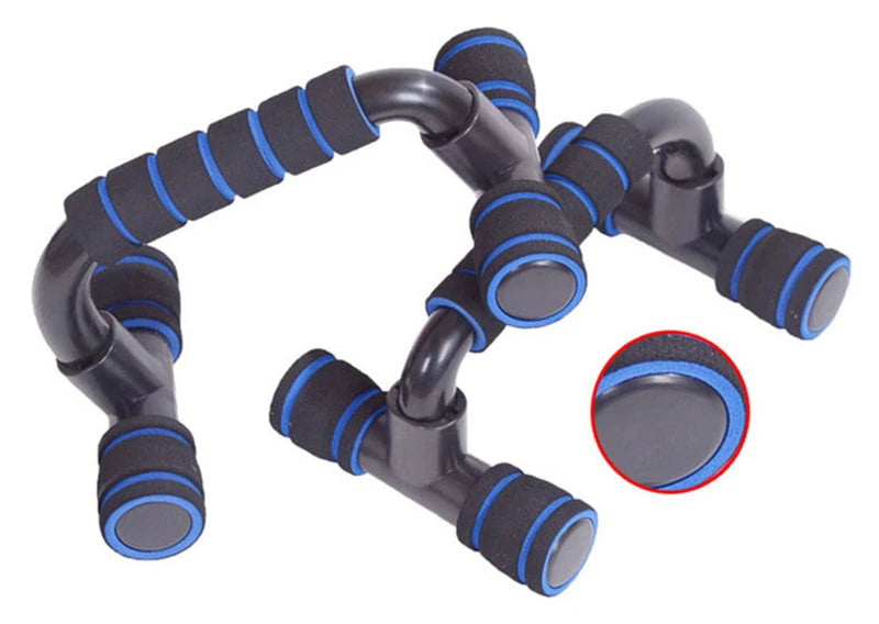 A pair of black push-up bars with blue foam-padded handles, shown against a white background.