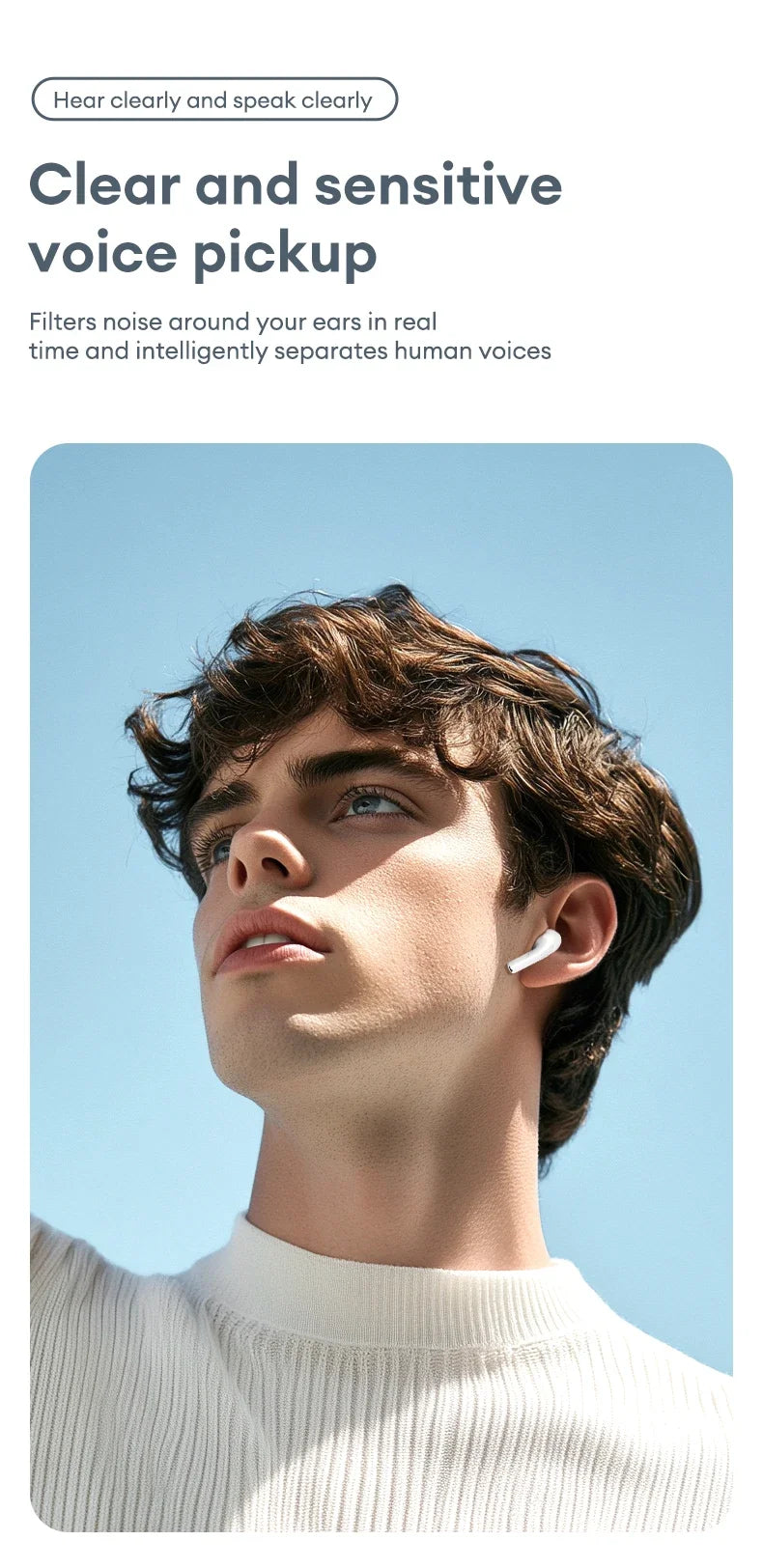 Young man wearing a sleek, white wireless earbud against a blue sky background.