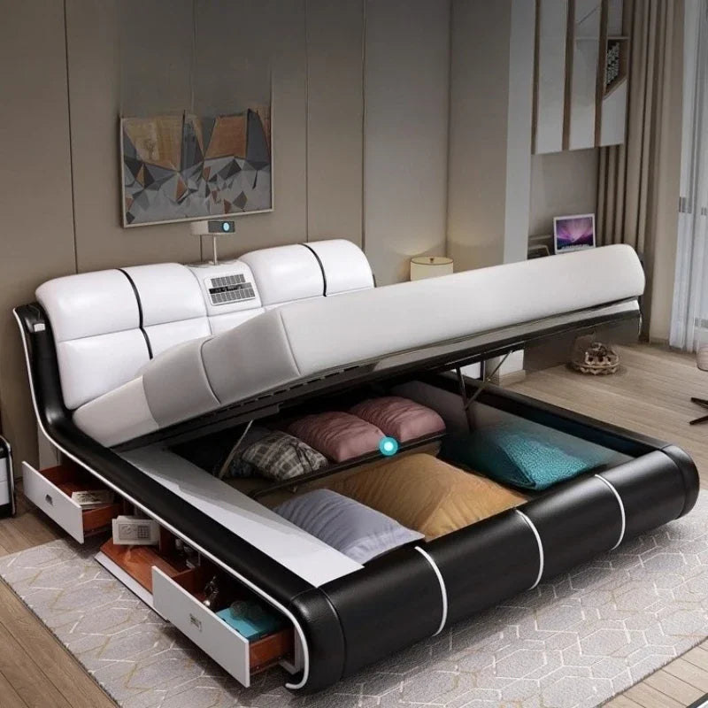 Modern cream and black leather bed frame with a gas-lift storage base and built-in side drawers in a bedroom setting.