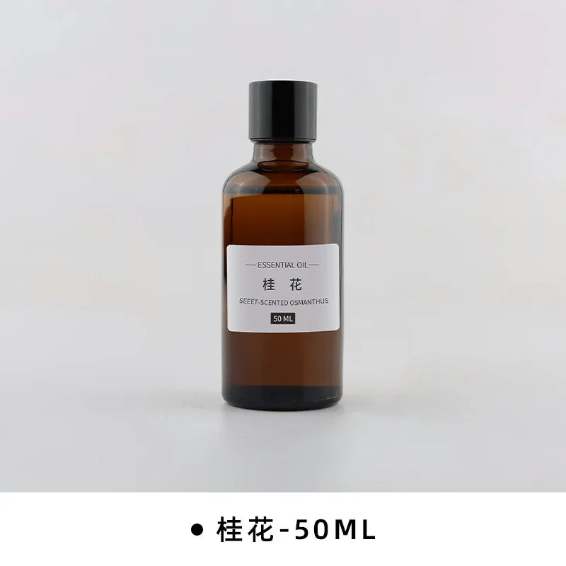 50ml amber glass bottle of Osmanthus essential oil with a black screw cap and minimalist white label.
