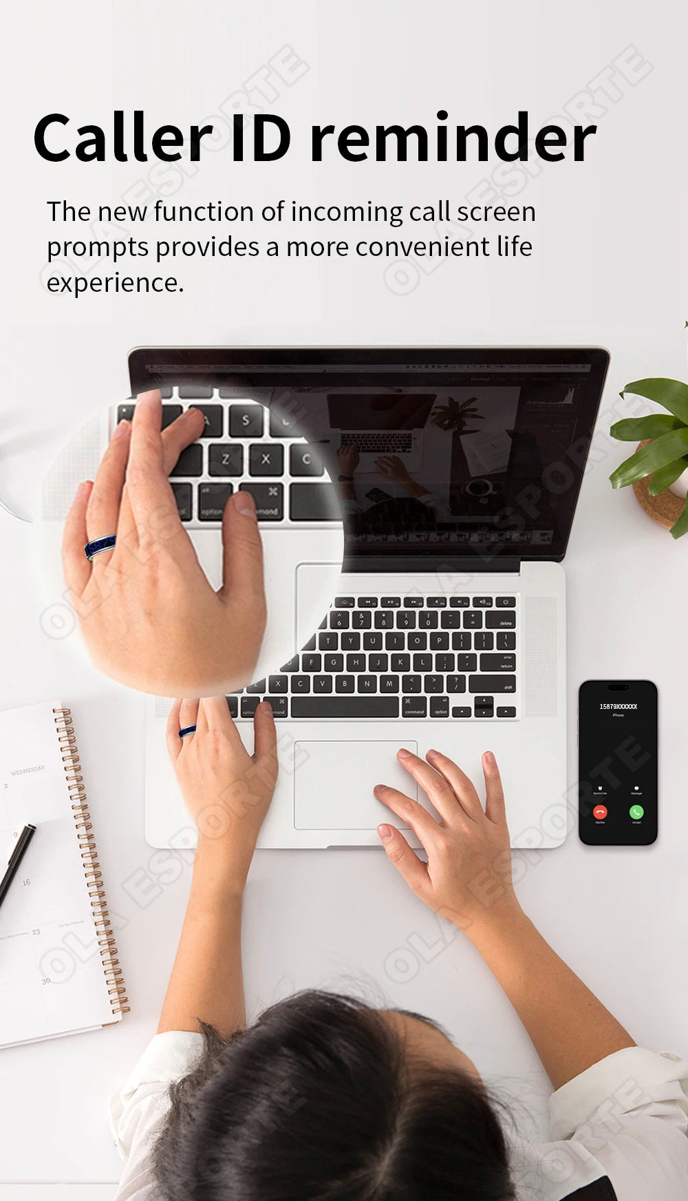 A sleek navy blue smart fitness ring worn on the finger while typing on a laptop, with an incoming call on a phone.