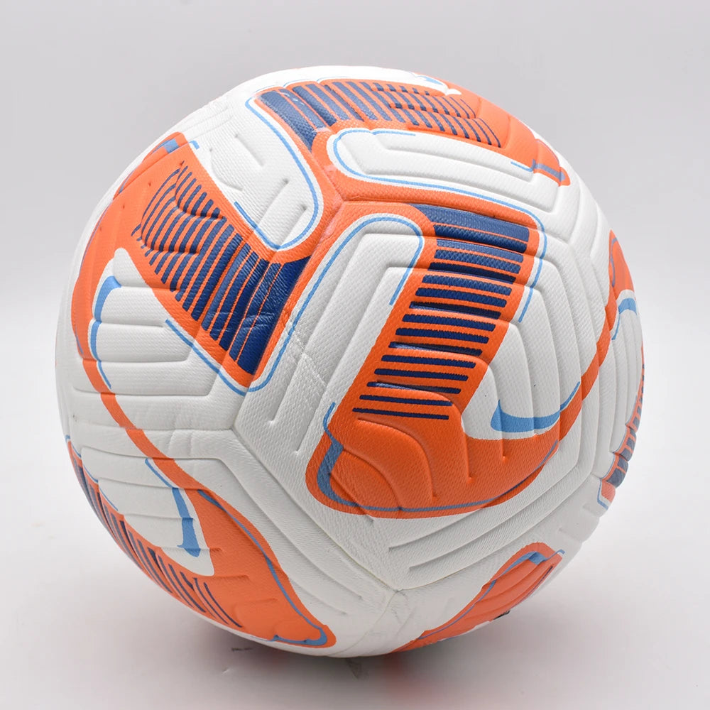 White football featuring a bold orange and blue graphic pattern with embossed texture on a light grey background.