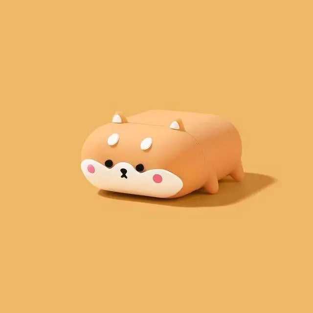 Tan silicone Shiba Inu dog AirPods case with cute character design on a matching background.