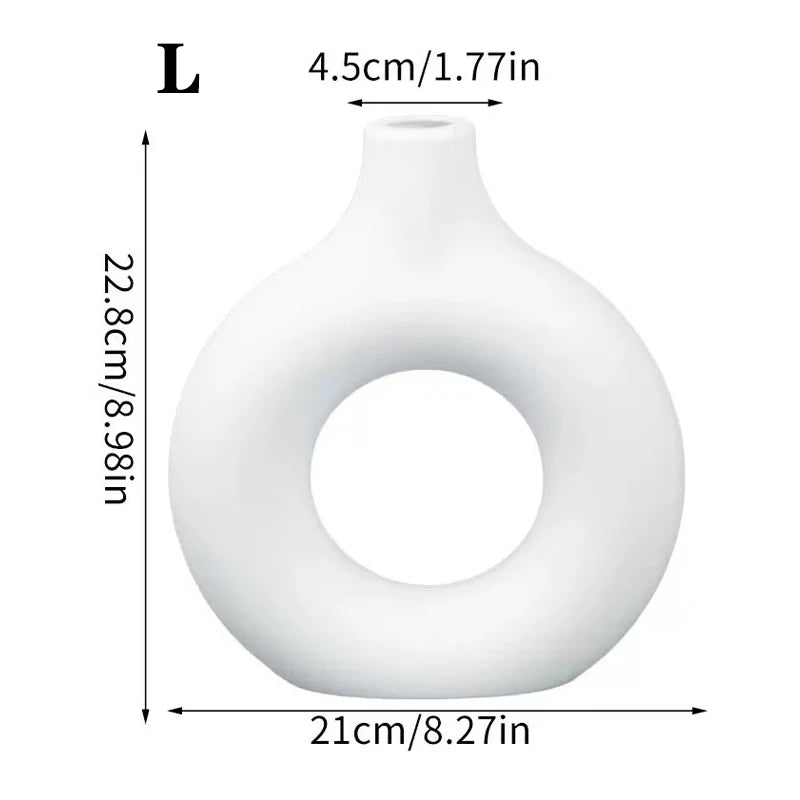 Minimalist white Nordic-style donut vase with a circular centre, shown with height and width dimensions.