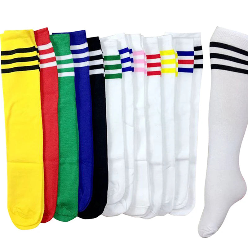 Multi-coloured set of knee-high socks, each featuring three contrast stripes at the top. Soft cotton-blend fabric.