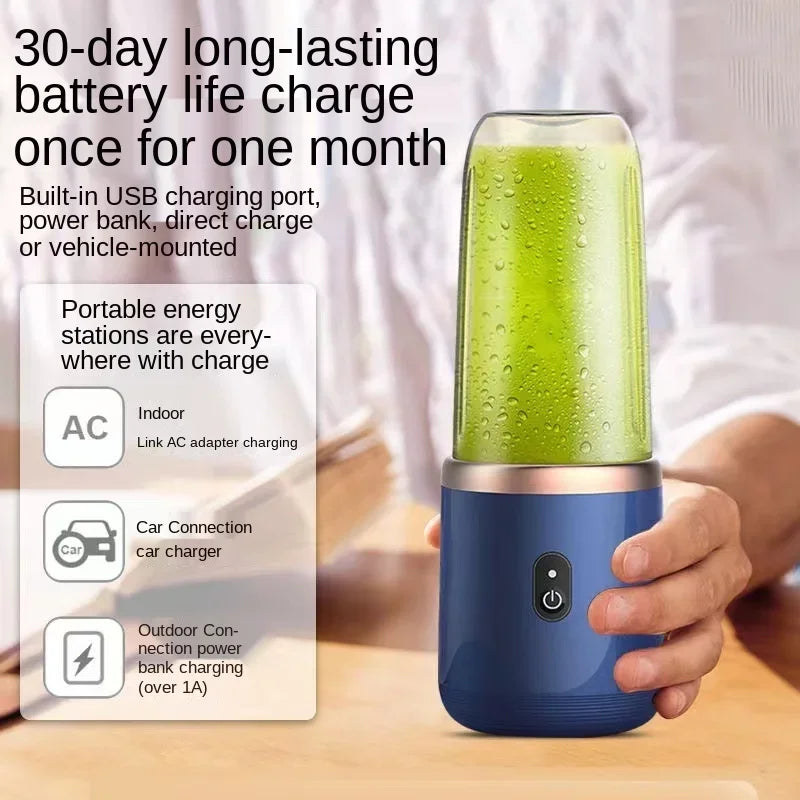 Portable blender with a blue base, rose gold accent, and clear cup containing a green smoothie.