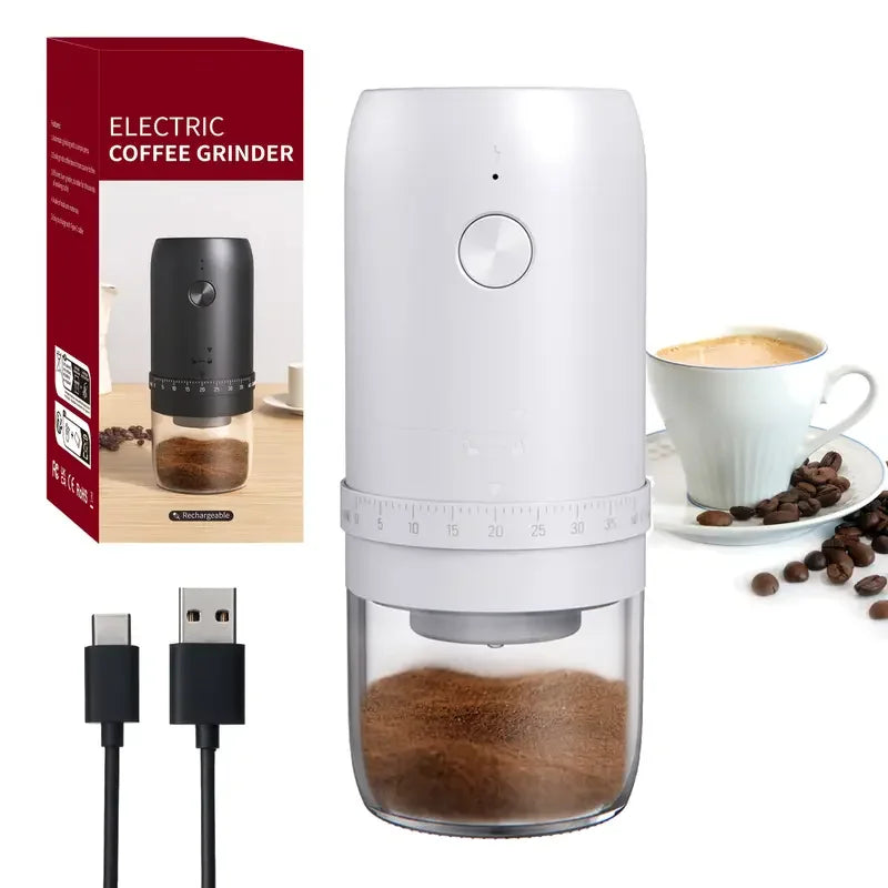 White portable electric coffee grinder with a clear base, grind dial, USB charging cable, and packaging box.
