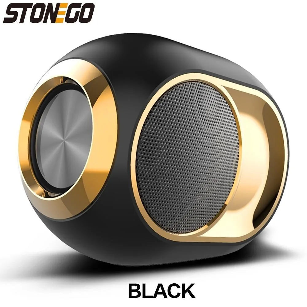 Compact black and gold portable wireless speaker with a sleek, modern rounded design and metallic speaker grille.