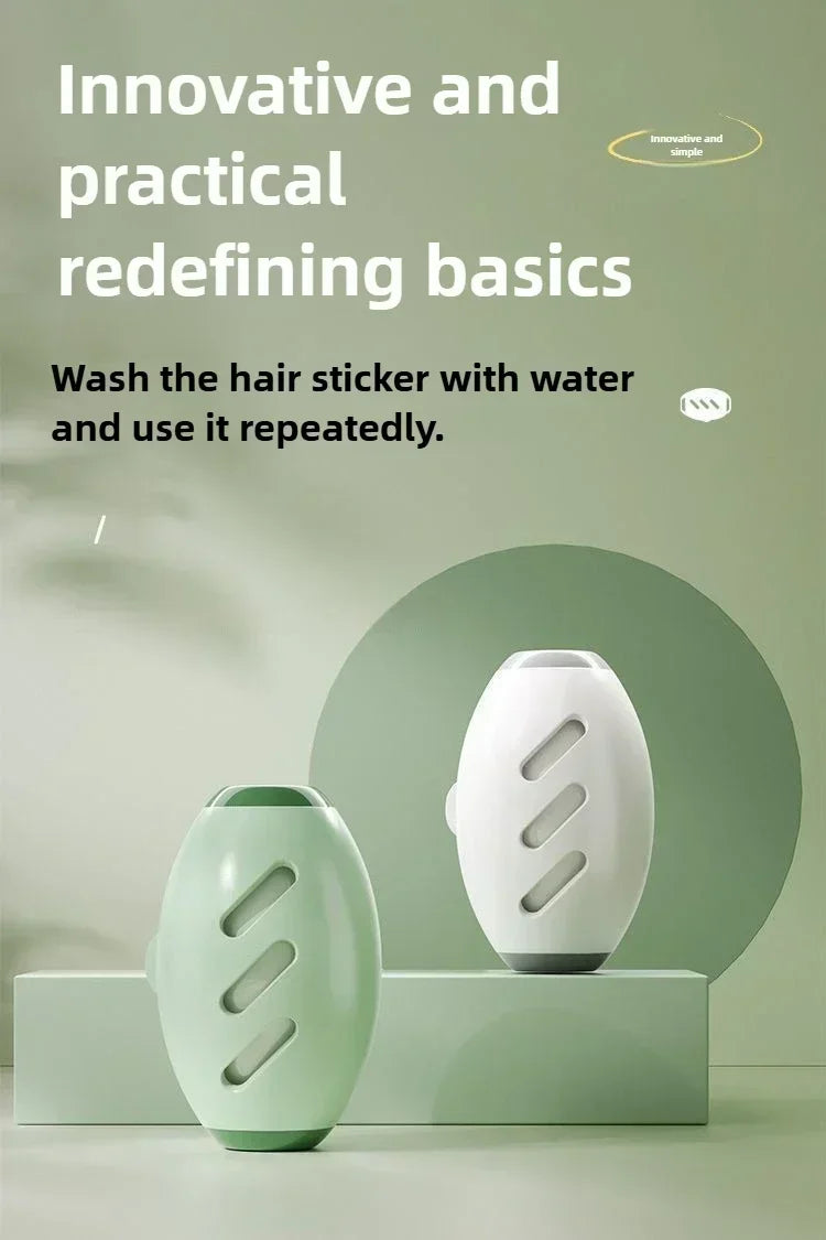 Two oval-shaped, washable hair-removing stickers in sage green and white, displayed on a matching green podium.