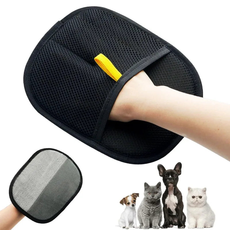 Black mesh pet grooming mitt with a yellow loop, shown being worn to groom a dog or cat.