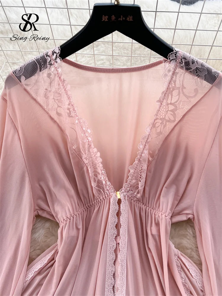 Pink sheer mesh long-sleeve robe with a deep V-neck and delicate floral lace trim along the edges.